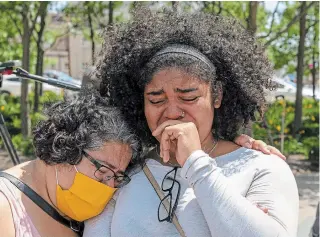  ?? FRANK GUNN THE CANADIAN PRESS ?? Two women react after the verdict in the Dafonte Miller assault trial in Oshawa.