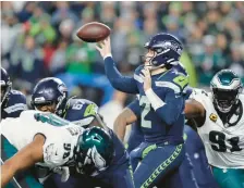  ?? JOHN FROSCHAUER/AP ?? The Eagles failed to pressure Seahawks backup quarterbac­k Drew Lock and he led Seattle on the game-winning drive.