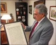  ?? CARL HESSLER JR. — DIGITAL FIRST MEDIA ?? Montgomery County Senior Judge Emanuel A. Bertin fondly recalls gift, a framed copy of prose poem “Desiderata,” that the late Judge Horace A. Davenport gave to him when Davenport retired in 2003.