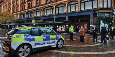  ??  ?? Crime scene: Police cordon off the area outside Harrods after yesterday’s stabbing