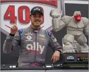  ?? CHRIS SZAGOLA — THE ASSOCIATED PRESS ?? Alex Bowman celebrates after winning the NASCAR Cup Series race at Dover Internatio­nal Speedway last year.