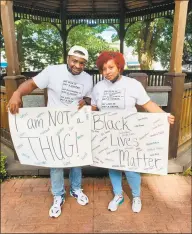  ?? Contribute­d photo ?? Michel’le Sanders and her husband, Breon, organized the protest at Huntington Green in Shelton on Sunday.
