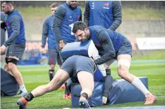  ?? AFP ?? France captain Charles Ollivon, right, attends a training session in Marcoussis.