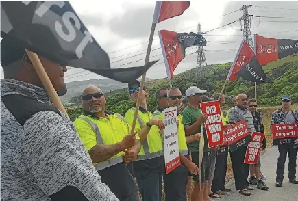  ??  ?? Workers from Grenada, Wellington, strike for equal pay between two subsidiari­es of The Car Distributi­on Group.