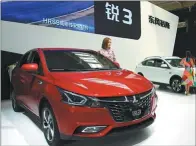  ?? DONG JINGQI / FOR CHINA DAILY ?? Dongfeng Yulon’s Luxgen models are displayed at an auto show in Changchun, Jilin province.