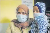  ?? PARDEEP PANDIT/HT ?? A woman, who returned from Australia, going for a checkup with her 21-month-old granddaugh­ter at the civil hospital in Jalandhar on Saturday.