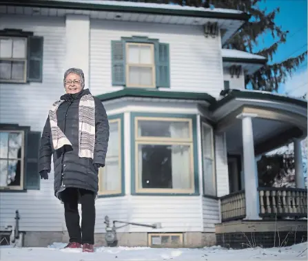  ?? MATHEW MCCARTHY WATERLOO REGION RECORD ?? Jean Becker, senior adviser of Indigenous initiative­s at Wilfrid Laurier University, stands next to Lucinda House on Albert Street in Waterloo. It will be the new home for Laurier's Indigenous Student Centre.