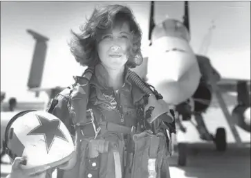  ?? Thomas P. Milne U.S. Navy ?? TAMMIE Jo Shults, shown in 1992, was one of the first women to fly the F/A-18 Hornet fighter jet for the Navy.