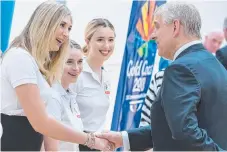  ??  ?? HRH Prince Andrew meets Games volunteers at Carrara.