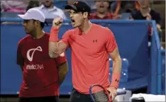  ?? AP PHOTO/ANDREW HARNIK ?? Andy Murray, of Britain, reacts after winning a point in a match against Marius Copil, of Romania, during the Citi Open tennis tournament in Washington, on Friday.