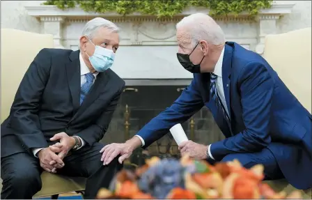  ?? ASSOCIATED PRESS FILE ?? President Joe Biden meets with Mexican President Andrés Manuel López Obrador in the Oval Office of the White House in Washington, Nov. 18. The Summit of the Americas is a little more than two weeks away in Los Angeles, and there’s still no clear answer on what countries are going.