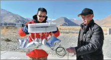  ?? JIGME DORJE / XINHUA ?? Middle: Researcher­s collect greenhouse gases at an atmospheri­c comprehens­ive research station in the Xizang autonomous region on May 23.