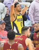  ?? DAVID RICHARD/USA TODAY SPORTS ?? Pacers guard Tyrese Haliburton reacts after he fouled Cleveland’s Max Strus on a 3-point shot attempt on Friday at Rocket Mortgage FieldHouse.