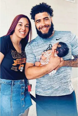  ?? [PHOTO COURTESY OF ASHLEY STEPHENS] ?? Oklahoma State offensive lineman Larry Williams and his girlfriend, Ashley Stephens, had their daughter, Ava, in June.