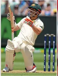  ??  ?? 1 Oh no: Warner can’t believe it as his miscued pull shot is caught by Broad