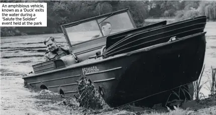  ??  ?? An amphibious vehicle, known as a ‘Duck’ exits the water during a ‘Salute the Soldier’ event held at the park