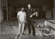  ?? Gustavo Huerta / Staff photograph­er ?? LaDon Johnson, left, and Conroe police Lt. Brent Stowe have a new vision for the old Conroe Normal & Industrial College.