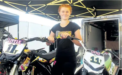  ?? BERND FRANKE/POSTMEDIA NEWS ?? Taia Little, 13, of Welland is leading the 85 cc and 250 Novice divisions in points in her first full season racing motorcycle­s at Welland County Speedway.