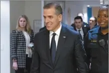  ?? AP photo ?? Hunter Biden departs after a closed door private deposition with House committees leading the President Biden impeachmen­t inquiry, on Capitol Hill on Feb. 28, in Washington.
