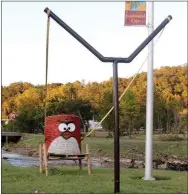  ??  ?? A scene depicted by SWC Tire involves three hay bales decorated as Angry Birds characters. One bird is staged across the parking lot, poised for takeoff in a slingshot, while another bird sits next to a pig awaiting destructio­n.