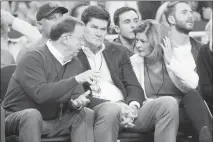  ?? SAM MORRIS / LAS VEGAS NEWS BUREAU ?? Former UNLV Athletic Directors Jim Livengood, left, and Tina Kunzer-murphy, right, chat with Mountain West Commission­er Craig Thompson at the UNLV vs. Duke basketball game in December. Last week Thompson called on MWC teams to strengthen their schedules.