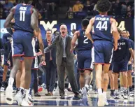 ?? Kathleen Batten / Associated Press ?? Coach Dan Hurley and the UConn men’s basketball team will take on Marquette on Tuesday.