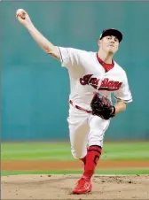  ?? ASSOCIATED PRESS ?? CLEVELAND INDIANS STARTING PITCHER Trevor Bauer delivers in the first inning of Game 1 of the American League Division Series against the New York Yankees on Thursday in Cleveland.