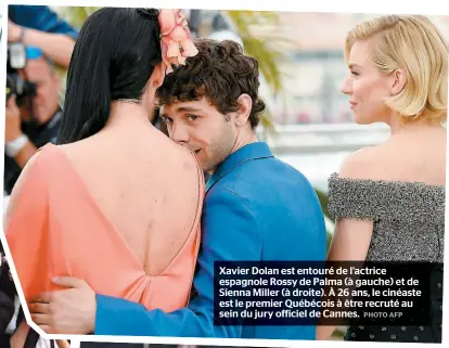  ??  ?? Xavier Dolan est entouré de l’actrice espagnole Rossy de Palma (à gauche) et de Sienna Miller (à droite). À 26 ans, le cinéaste est le premier Québécois à être recruté au sein du jury officiel de Cannes.