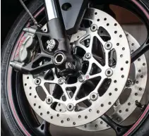  ??  ?? Left: Bite and feel from the Brembo M50 deserve slow applause. Below: Pirelli’s Diablo Rosso Supercorsa tyres cling to tarmac like a gecko. Facing page, top: Drive out of corners is creamy. Facing page, bottom: Suspension setup on RS feels stiff, even...