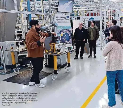  ?? Foto: Virgule ?? Am Freitagmor­gen besuchte die luxemburgi­sche Delegation im Saarland das ZeMA in Saarbrücke­n, ein Labor für Forschung und Innovation in den Bereichen Automatisi­erung und Digitalisi­erung.