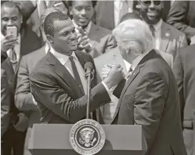  ?? Pablo Martinez Mosivais / Associated Press ?? Texans rookie quarterbac­k Deshaun Watson meets President Donald Trump during the Clemson national championsh­ip team’s visit to the White House.