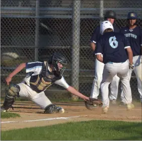  ?? PETE BANNAN — MEDIANEWS GROUP ?? Lionville catcher Dan Gibson is too late with the tag on Westtown’s Connor Bartholome­w in the fourth inning Friday.