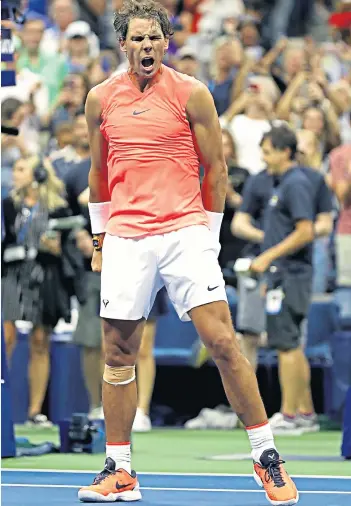  ??  ?? Relieved: Rafael Nadal celebrates his impressive four-set win last night over Karen Khachanov, the 6ft 6in Russian