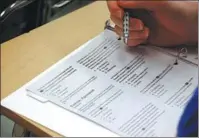  ?? ALEX BRANDON / AP ?? A student attends a college test preparatio­n class at Holton Arms School in Maryland, United States.