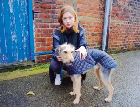  ?? HARPERCOLL­INS CANADA LTD. ?? Fiona Mozley and her dog — “a small lurcher” — were both excited by news of her Man Booker prize nomination.