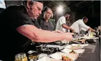  ?? ?? Chef Gavin St. Denis (left) and his team took home the top prize last year at the Diced in Dayton Chef’s Challenge event (pictured) and proved themselves again at this year’s Battle of the Bartenders.