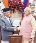  ?? PHOTO: PTI ?? Prime Minister Narendra Modi ( right) with his Nepalese counterpar­t K P Sharma Oli at Hyderabad House in New Delhi on Saturday