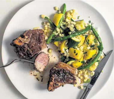  ?? Andrew Scrivani, © The New York Times Co. ?? Lamb Chops With Green Beans, Corn and Zucchini.