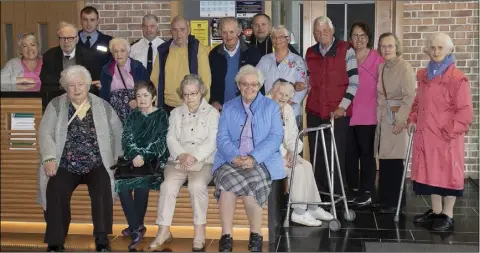  ??  ?? A group from St Brigid’s Club and Day Care Centre, whose base is beside the old garda barracks on Roche’s Road, pictured on their tour of the new Wexford Garda Station with Garda Joe Kelly and Chief Superinten­dent Patrick McMenamin.