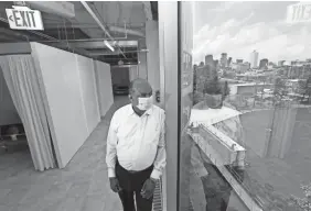  ?? JOE RONDONE/THE COMMERCIAL APPEAL ?? Brownsvill­e Mayor Bill Rawls stands inside the former Commercial Appeal building in Memphis.