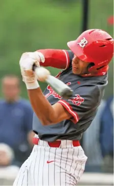  ?? STAFF PHOTO BY TROY STOLT ?? Baylor’s Danny Corona gets a hit during Friday’s 14-3 win over Ooltewah. The Red Raiders hit four home runs in the game.