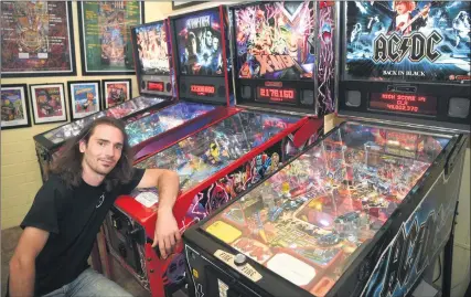 ??  ?? PINBALL ARMY: Nhill Pinball Museum co-owner Lyndon Carter is excited to host three days of pinball tournament­s, starting Friday. Picture: PAUL CARRACHER