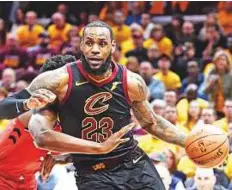  ?? USA Today Sports ?? ■ Cleveland Cavaliers forward LeBron James (23) drives against Toronto Raptors’ OG Anunoby (3) in game four of the second round of the 2018 NBA play-offs at Quicken Loans Arena.