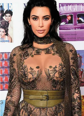  ??  ?? ‘FLAUNTING’: Kim Kardashian had millions of dollars worth of jewellery stolen from her when she was held at gunpoint during Paris Fashion Week last week. Above, Johnny Depp came to Victoria Mary Clarke’s aid when a would-be mugger pointed a gun at her...