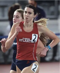  ?? COURTESY OF MICHAEL WADE ?? Norwood’s Marisha Thompson, competing for Florida Atlantic University, won her first NCAA indoor track race, the 1,000 metres, Jan. 16 in Birmingham.