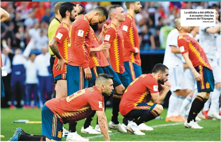  ??  ?? La défaite a été difficile à accepter chez les joueurs de l’Espagne. PHOTO AFP