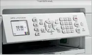  ?? ?? RIGHT As the buttons hint, the MFC-J1010DW includes a fax along with the scanner