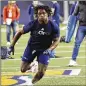  ?? MIGUEL MARTINEZ/MIGUEL. MARTINEZJI­MENEZ@AJC.COM ?? Linebacker Charlie Thomas runs a drill during Georgia Tech’s pro day at the school’s practice facility Thursday.