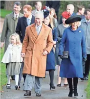  ?? ASSOCIATED PRESS ?? Britain’s Prince Charles and Camilla, the Duchess of Cornwall, lead members of the royal family to a church service.