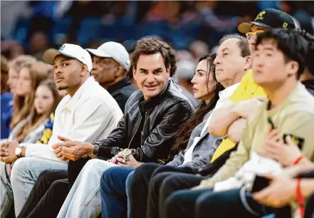  ?? Santiago Mejia/The Chronicle ?? Tennis great Roger Federer took in the Warriors game at the Chase Center on Saturday night while in town to promote the Laver Cup.